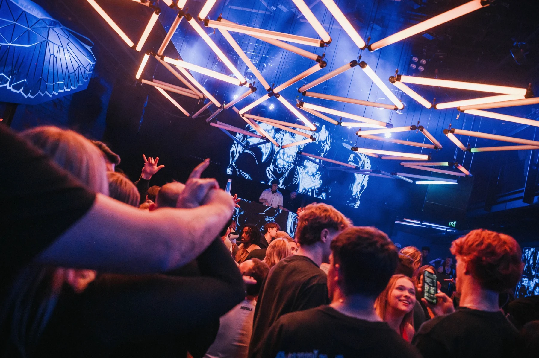 HASLOOM performing under club lighting